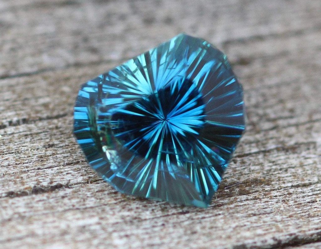 1.2 carat heart cut teal sapphire