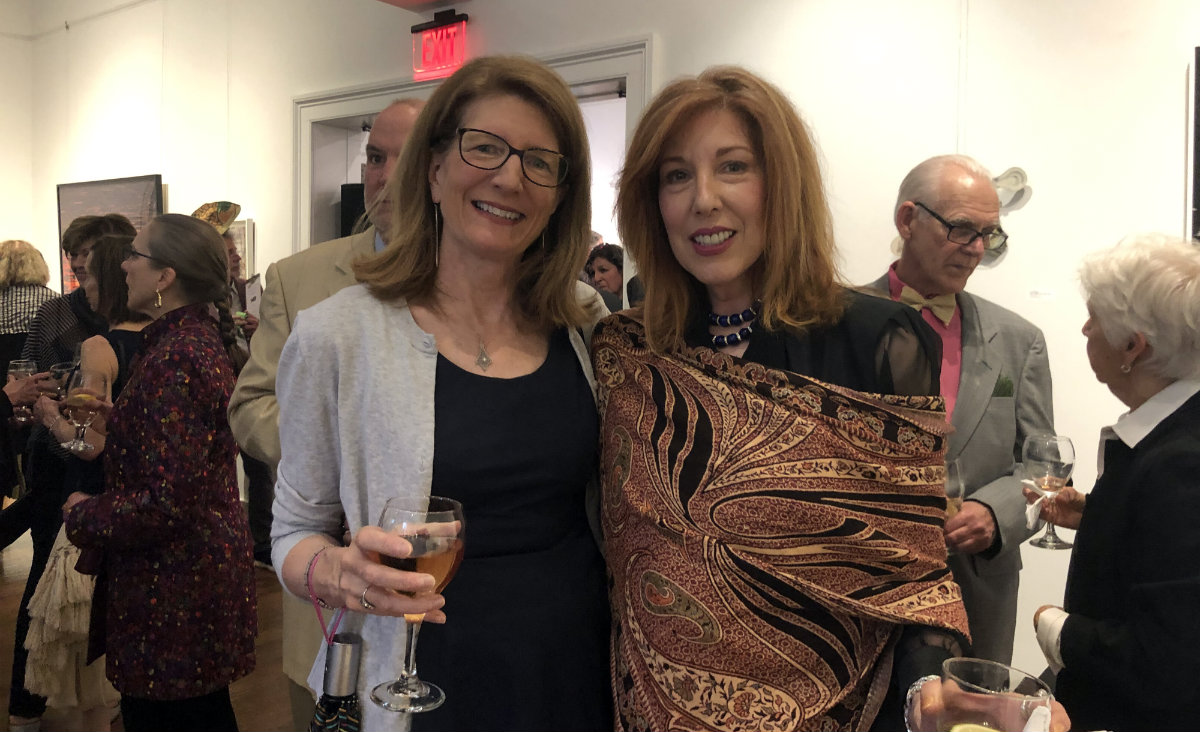 Martha Lane of the Columbia Economic Development Corporation and cookie artist/ball co-chair Pooky Amsterdam.