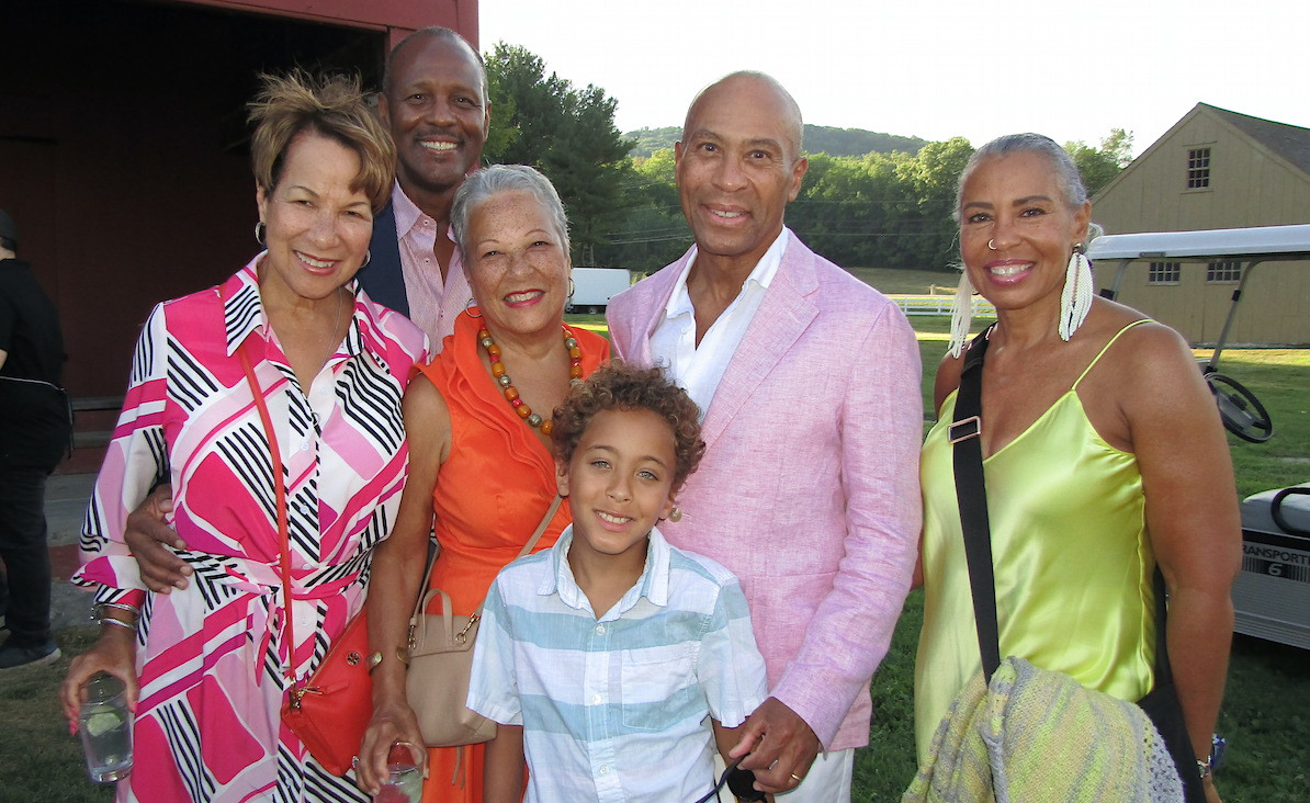 Gala co-chairs Diane B. Patrick and former Massachusetts Governor Deval Patrick pose with their grandson Gianluca (center), with Diane's sister Lynn Prine and her husband Reggie Prine (left), and Deval's sister Rhonda Patrick (right)