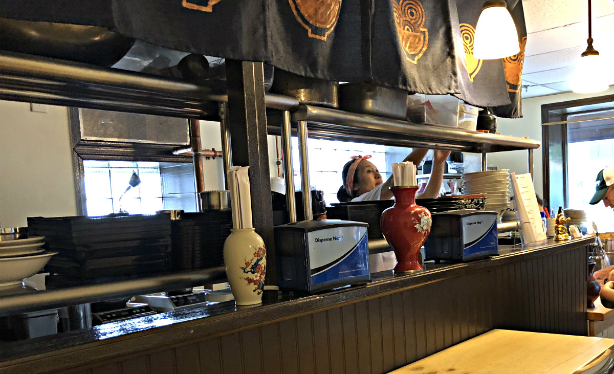 If you look closely, you can see Chef Jem Ezinga behind the counter.