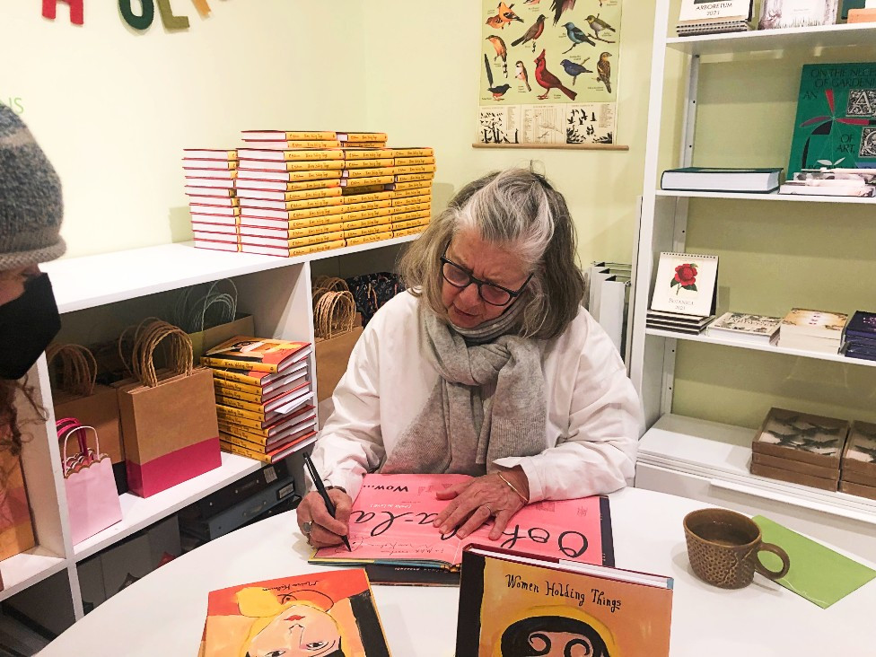 Fans brought other Kalman books for her to sign along with her new release.