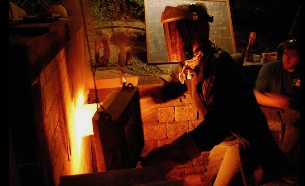 Susan Kotulak tends the kiln.&nbsp; - Courtesy Susan Kotulak