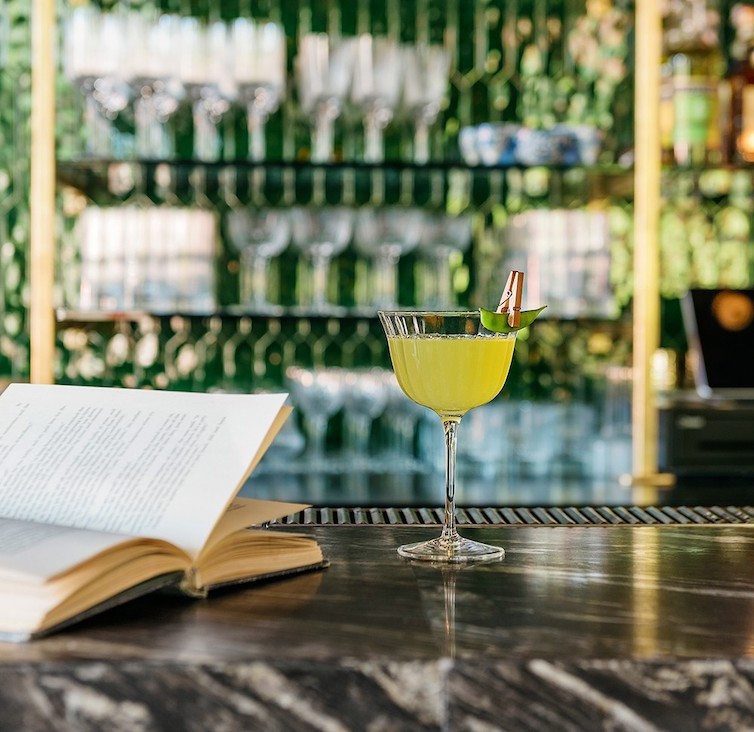 Lead Me to the Garden is an herbaceous gin cocktail served with a sugar snap clothes-pinned to the the coupe. Photo: Harrison Lubin Lead Me to the Garden is an herbaceous gin cocktail served with a sugar snap clothes-pinned to the the coupe. Photo: Harrison Lubin