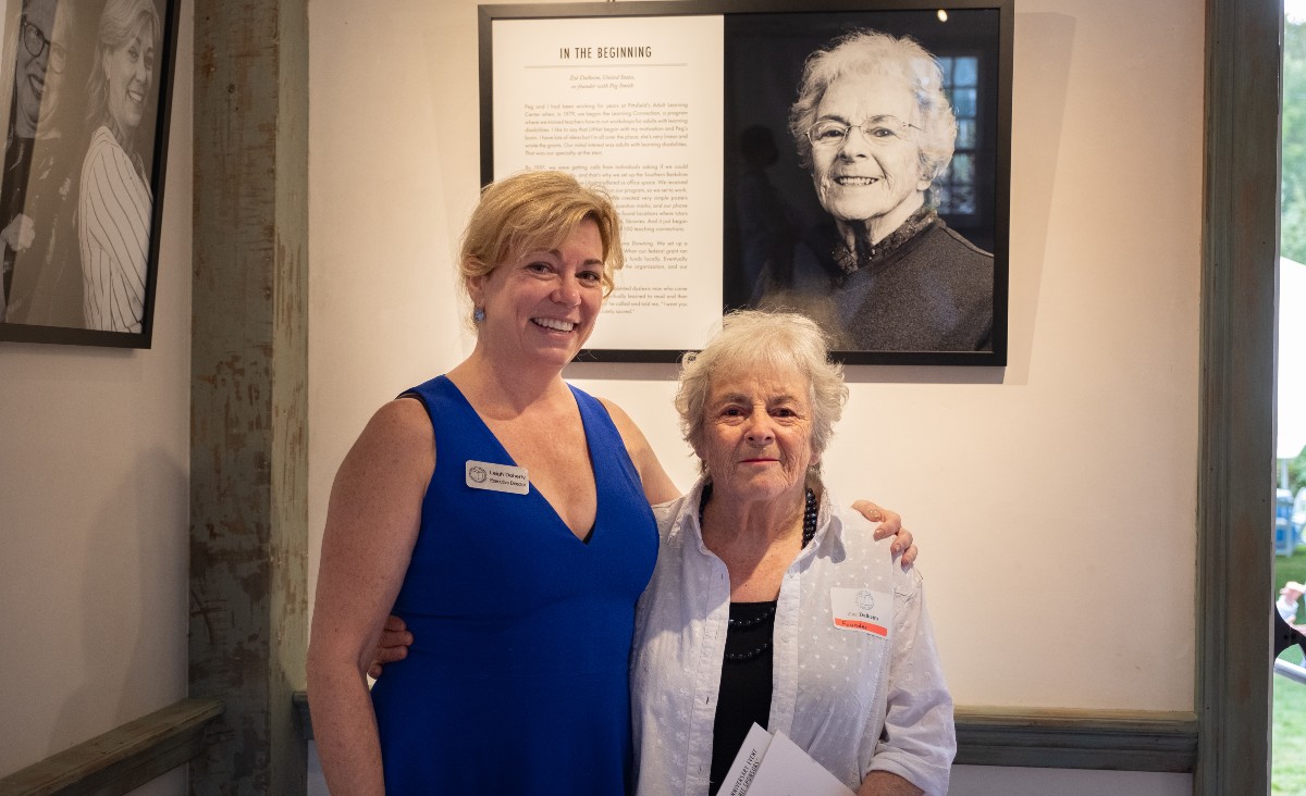 Leigh Doherty, LitNet's executive director, with Zoë&nbsp;Dalheim, LitNet's&nbsp;founder&nbsp;(in front of her photo)