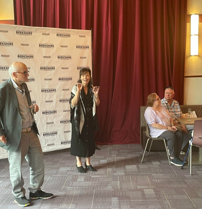 Kate Maguire, BTG artistic director, leads the toast.