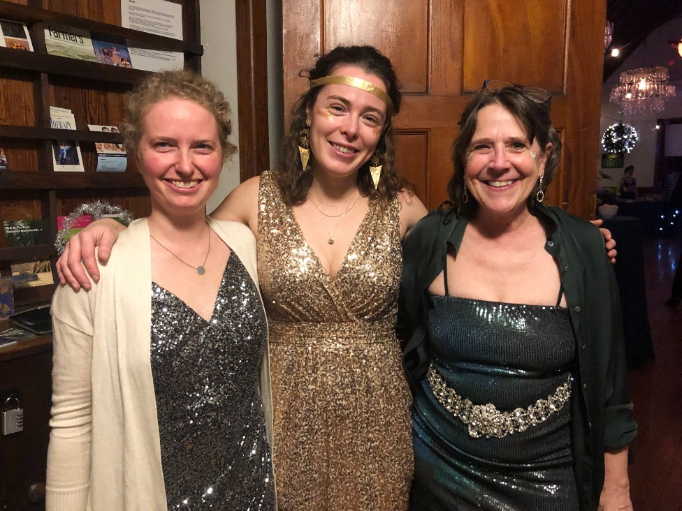 Maggie McRae, Dewely Hall manager; Clara Stickney, the office "fairy;" and Board Member Beth Carlson of Silo Media