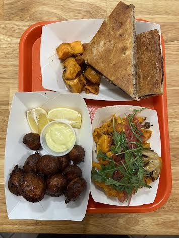Meatloaf sandwich, fish fritters and salad Meatloaf sandwich, fish fritters and salad