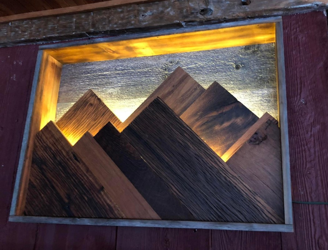 Troy Brown created an illuminated landscape out of excess wood pieces. - Rustic Gardens Troy Brown created an illuminated landscape out of excess wood pieces. - Rustic Gardens