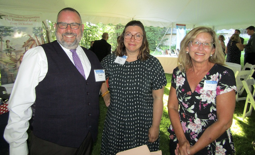 Berkshire United Way President and CEO Tom Bernard with MCLA&nbsp;Vice President for Strategic Initiatives Gina Puc, and Norman Rockwell Museum's newest employee, Sheryl Martin