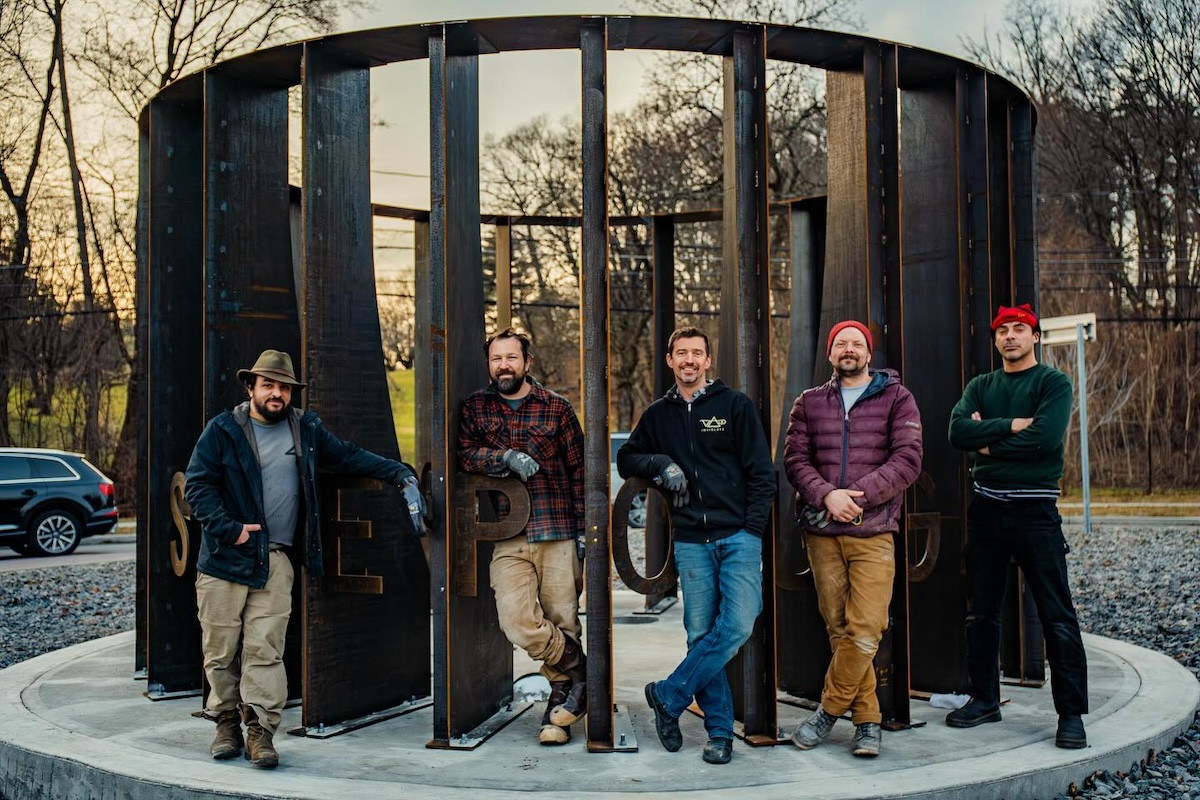 Some of the 4th State team: Isaac Zal, David Marcusen, Evan Clayton Mike Flynn and Christopher Castilla pose after instalation of the Corey Ingram Plaza sculpture in Poughkeepsie. Photo provided by 4th State.