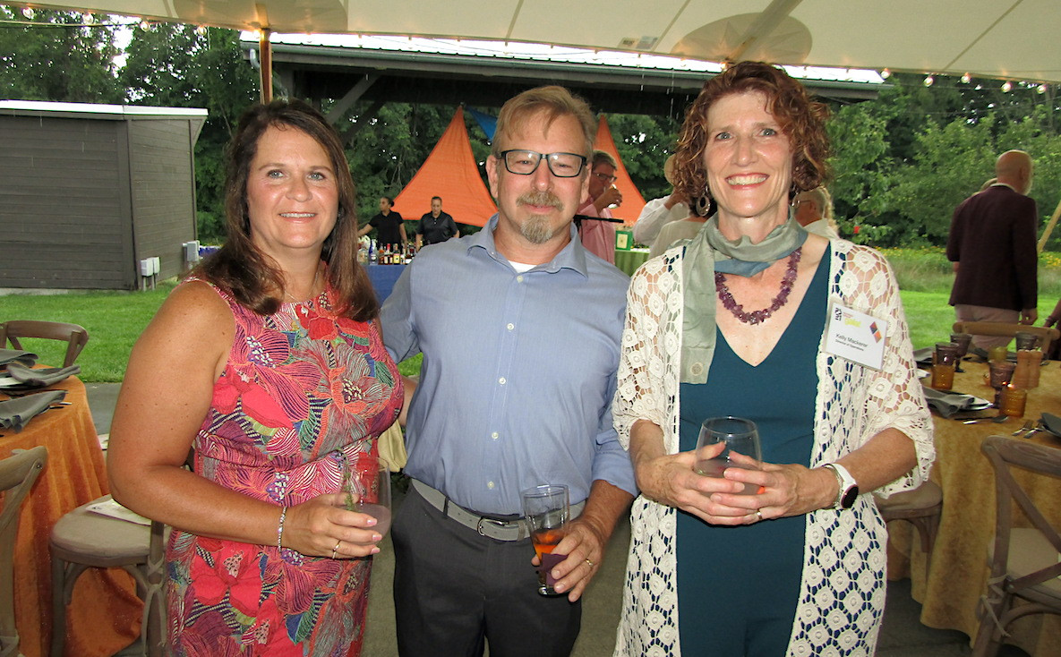 Amy Clifford, Tim Clifford of Clifford Construction and PS21 Director of Operations Kelly Mackerer