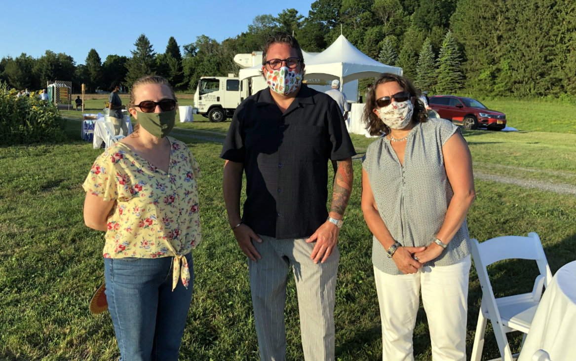 Anne Ebersman and Barbara Glassman flank Jonathan&nbsp; Cetnarski, the Center's executive director