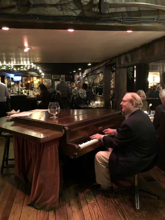 Roger Young entertains the after-shopping crowd at the venerable Fife 'n Drum.