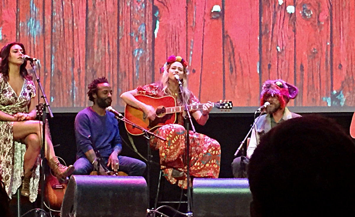 Sally Taylor sings a tune with her brother, Ben Taylor, in a hat he bought at the MASS MoCA shop. Sally Taylor sings a tune with her brother, Ben Taylor, in a hat he bought at the MASS MoCA shop.