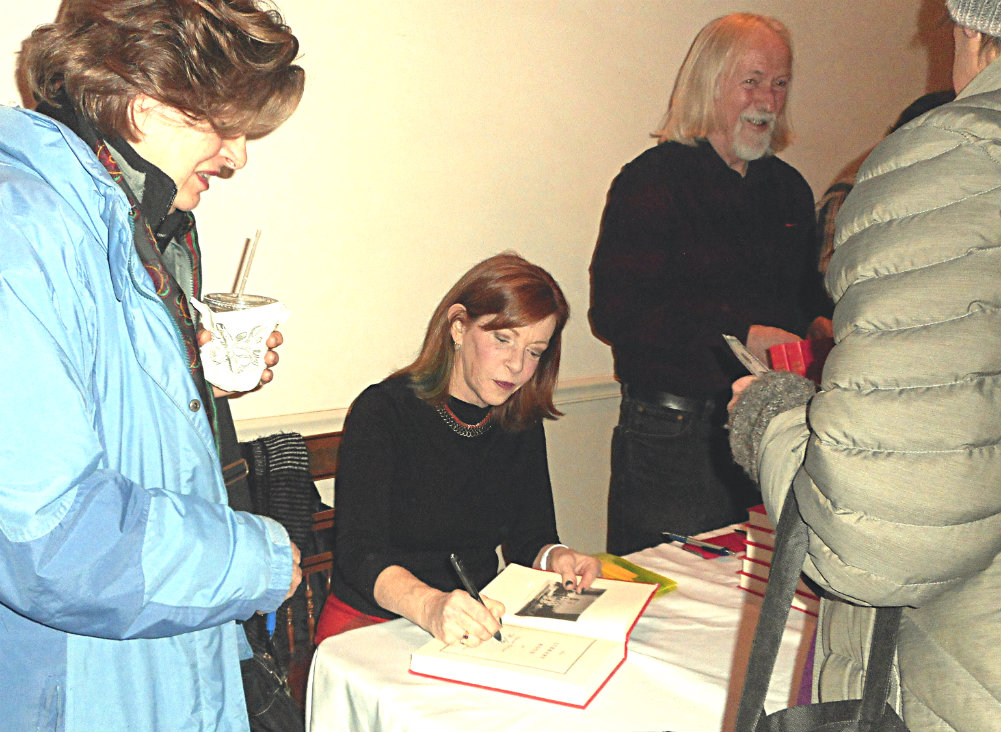 Author Susan Orlean signs copies of her latest work, The Library Book.