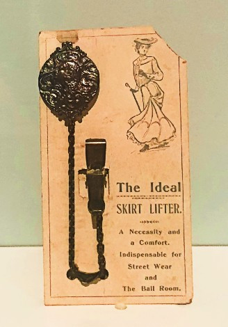 Victorian skirt lifter, a hands-free way for women to lift their skirts to keep them clean