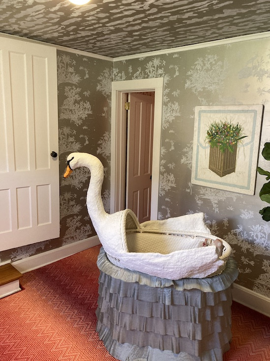 Swan Lullaby, tucked into one of the home's most diminutive spaces, was designed by Harry Heissmann using a pair of Tillett Textile's wallpapers. Photos by Hannah Van Sickle