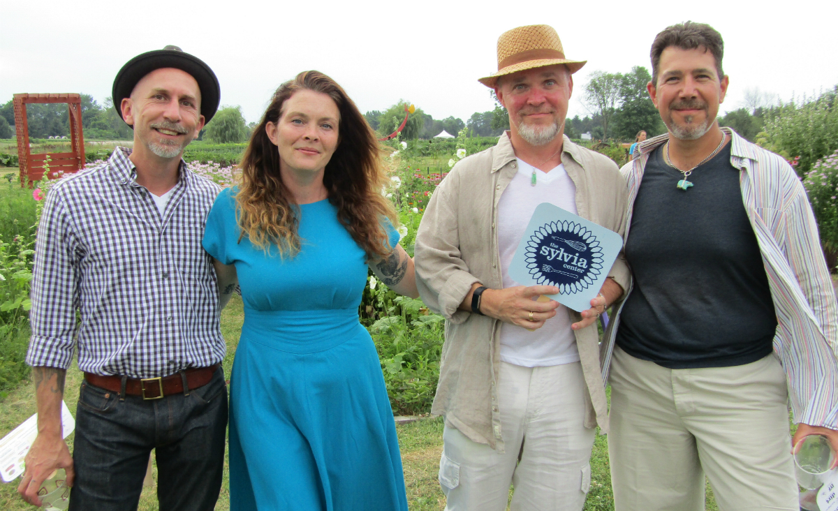 Jason Smith&nbsp;and&nbsp;Shaina Marron&nbsp;with&nbsp;Joe Poutre&nbsp;and&nbsp;Joe Herwich, whose daughters participate in Sylvia Center programs