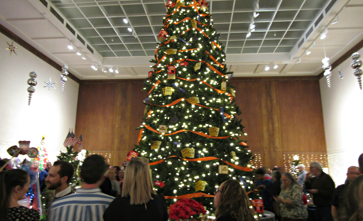 A towering tree holds court in the center of the Museum's Crane Room.