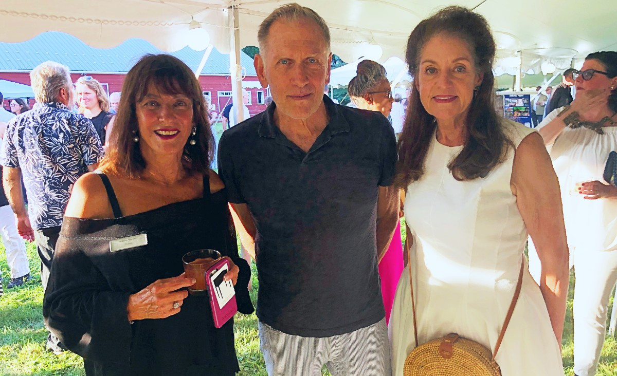 Trustees Kathy Weiser and Rae Gilson flank Alan Wanzenberg Trustees Kathy Weiser and Rae Gilson flank Alan Wanzenberg