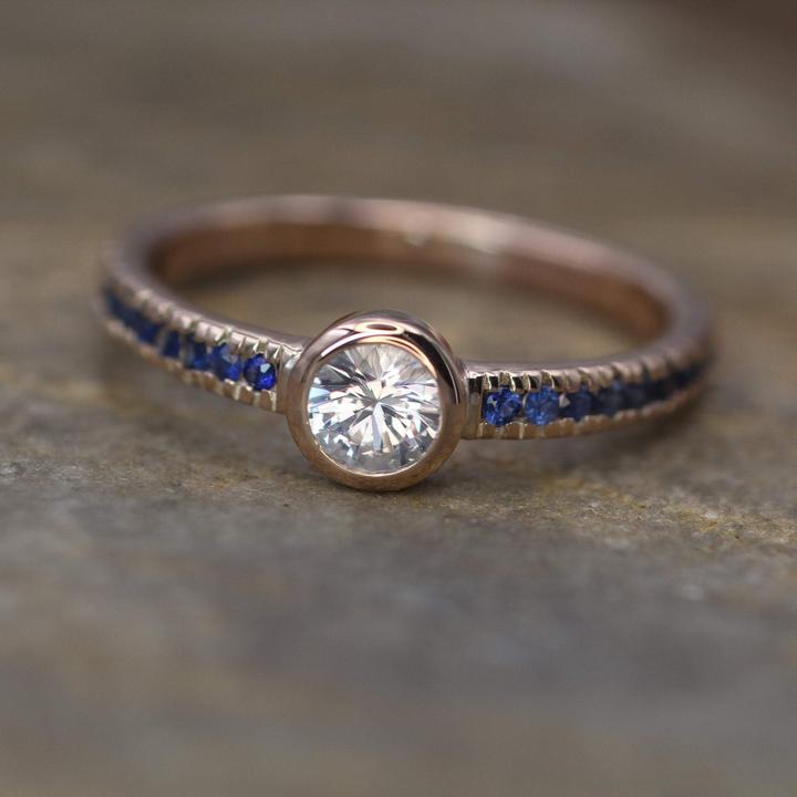 White and blue sapphire rose gold engagement ring