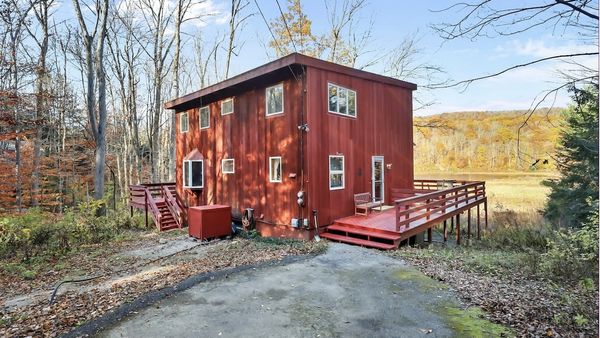 Red Cabin Getaway in Lee, $595,000