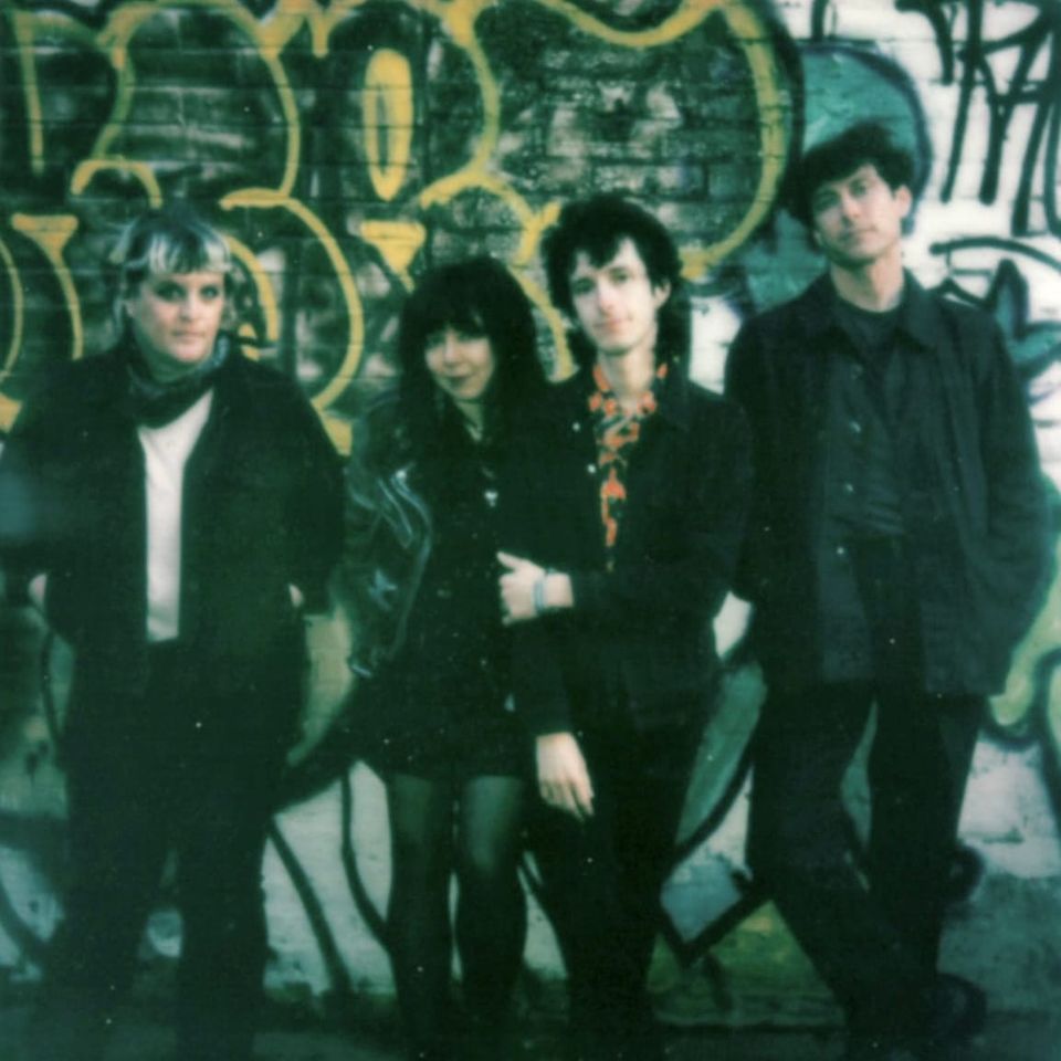 photograph of the band cult objects