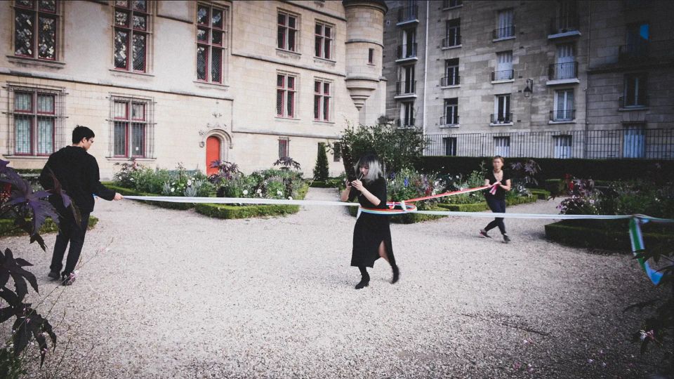 image of the artist performing their piece