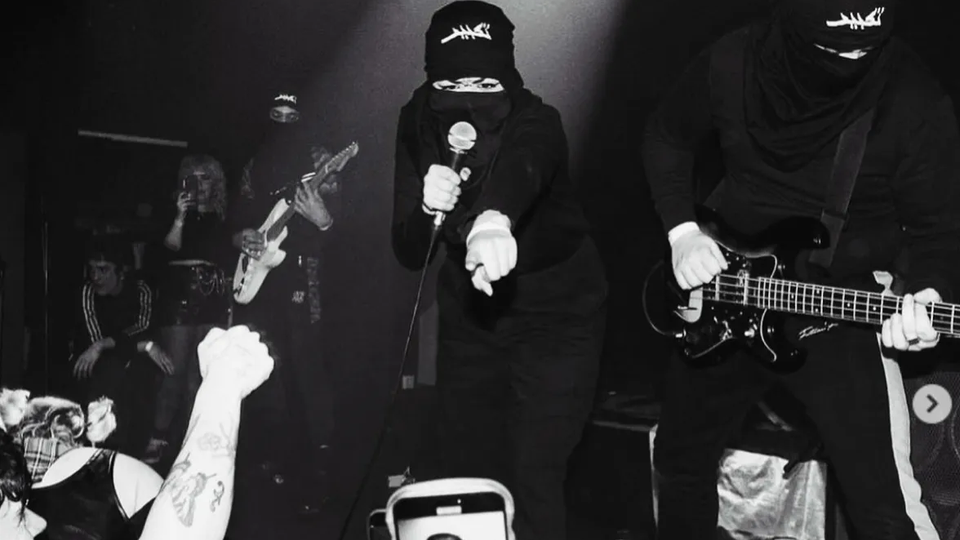 Photograph of the band performing live