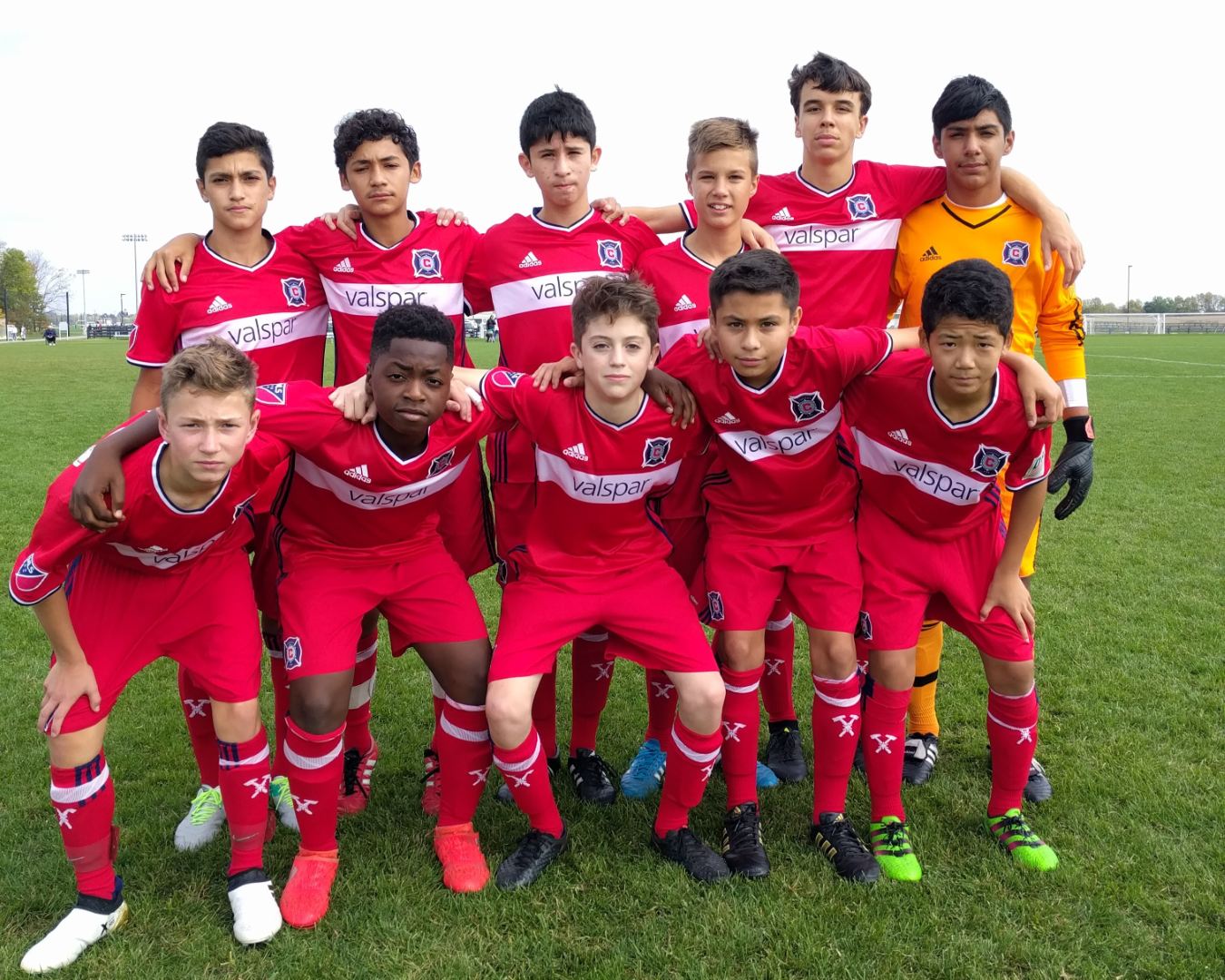 Brian Gutiérrrez starting XI photo with other Fire academy players