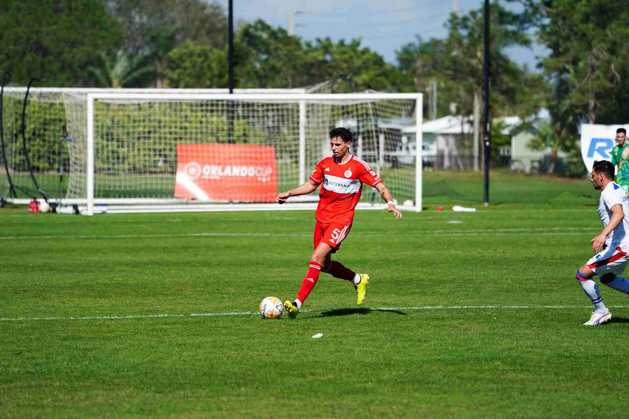 Sam Rogers, center-back for the Chicago Fire plays the ball in a preseason match against Fortaleza FC