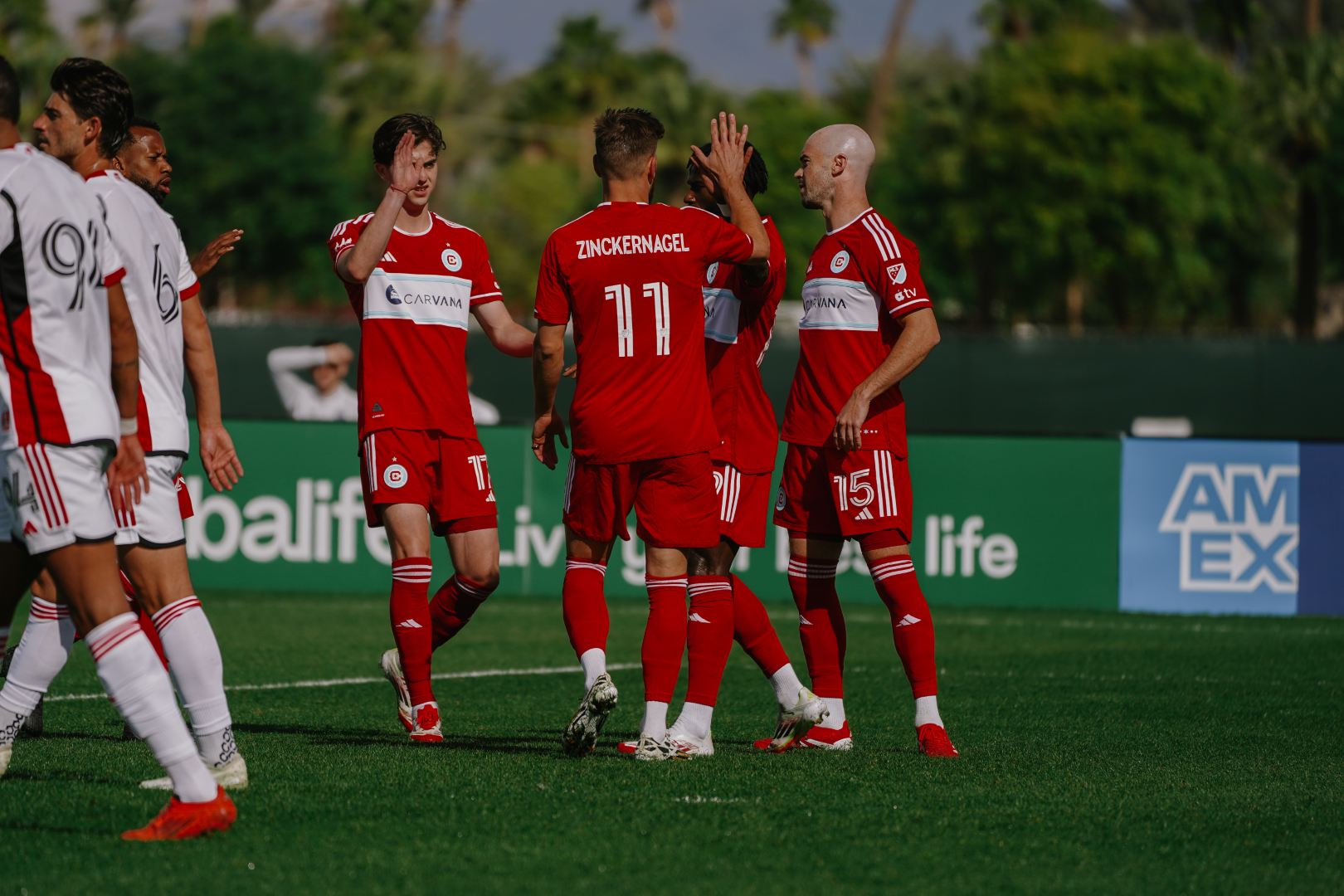 Zincekrnagel celebrates a goal at Coachella with Gutiérrez and Gutman