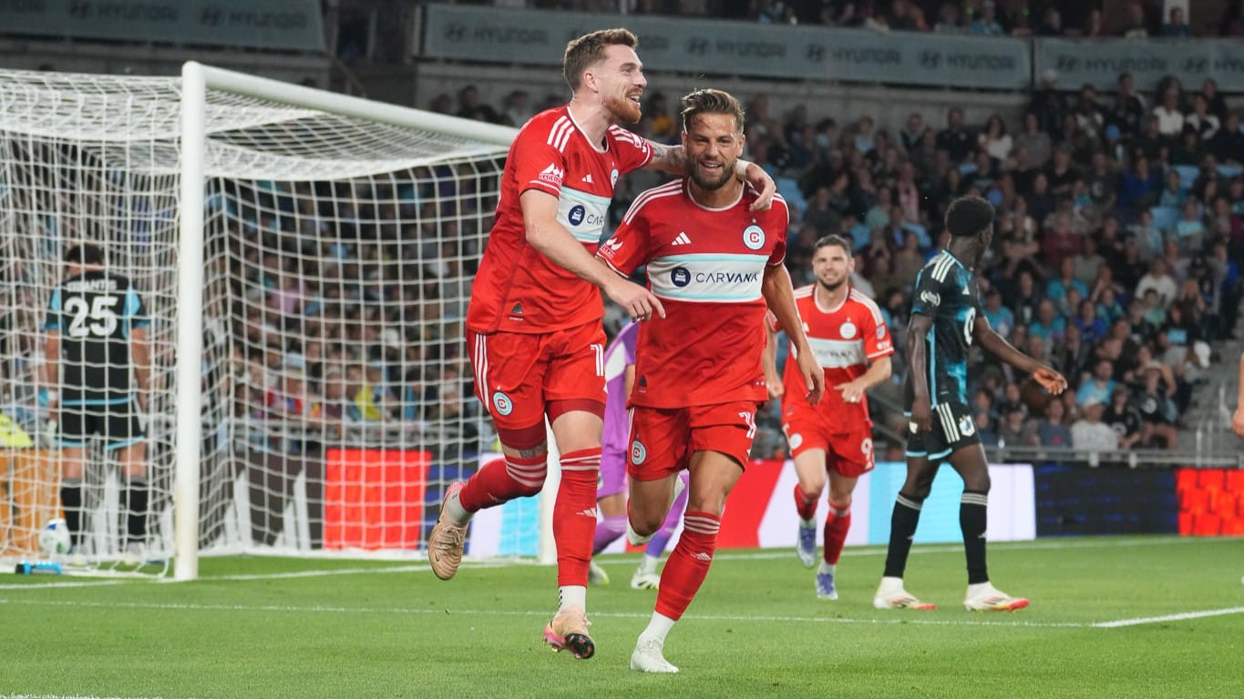 Joel Waterman and Philip Zinckernagel celebrate after Waterman's goal at Allianz Field in St. Paul, Minn. on September 25, 2025 