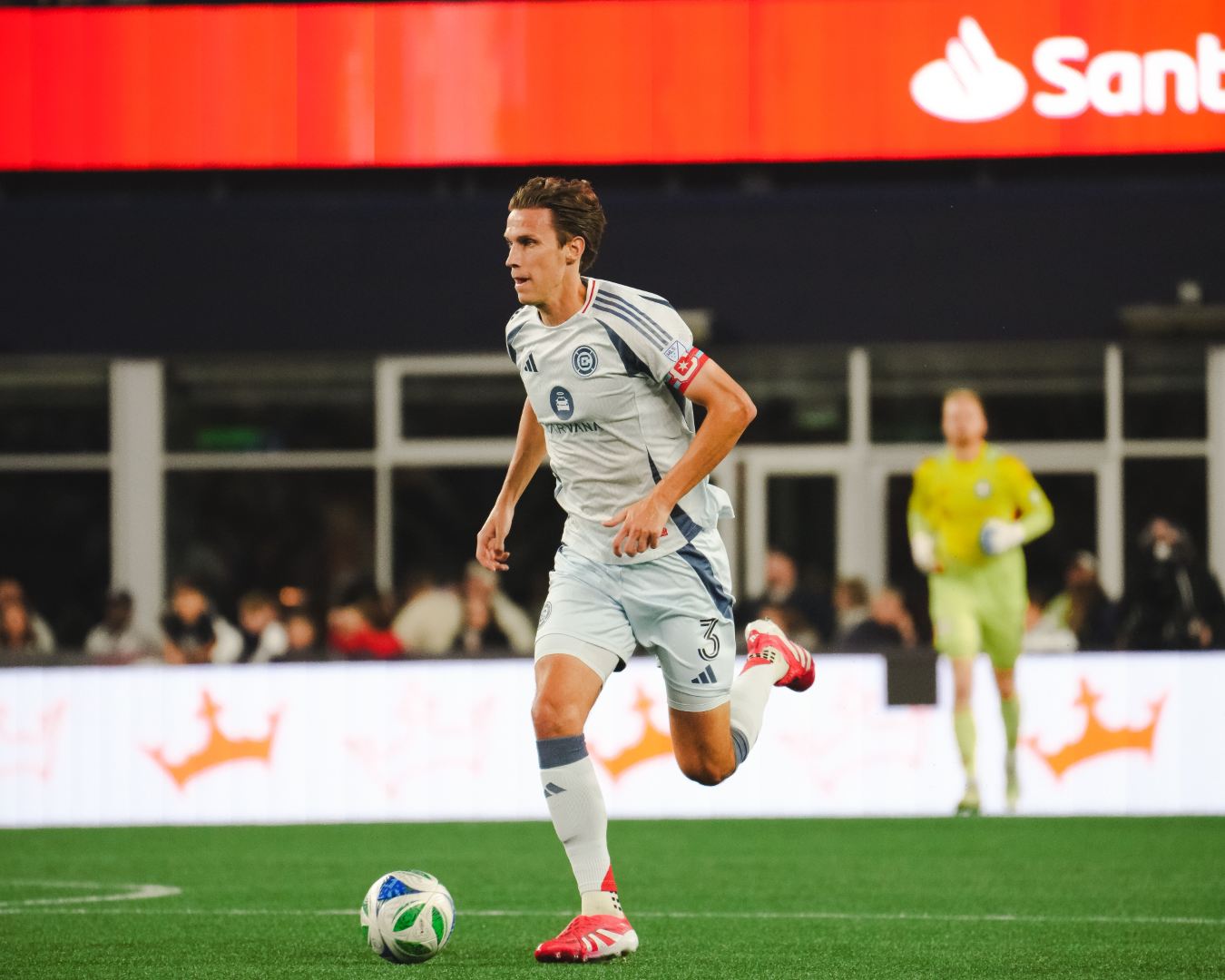 Jack Elliott plays the ball for the Chicago Fire during their game against the New England Revolution on October 18, 2025