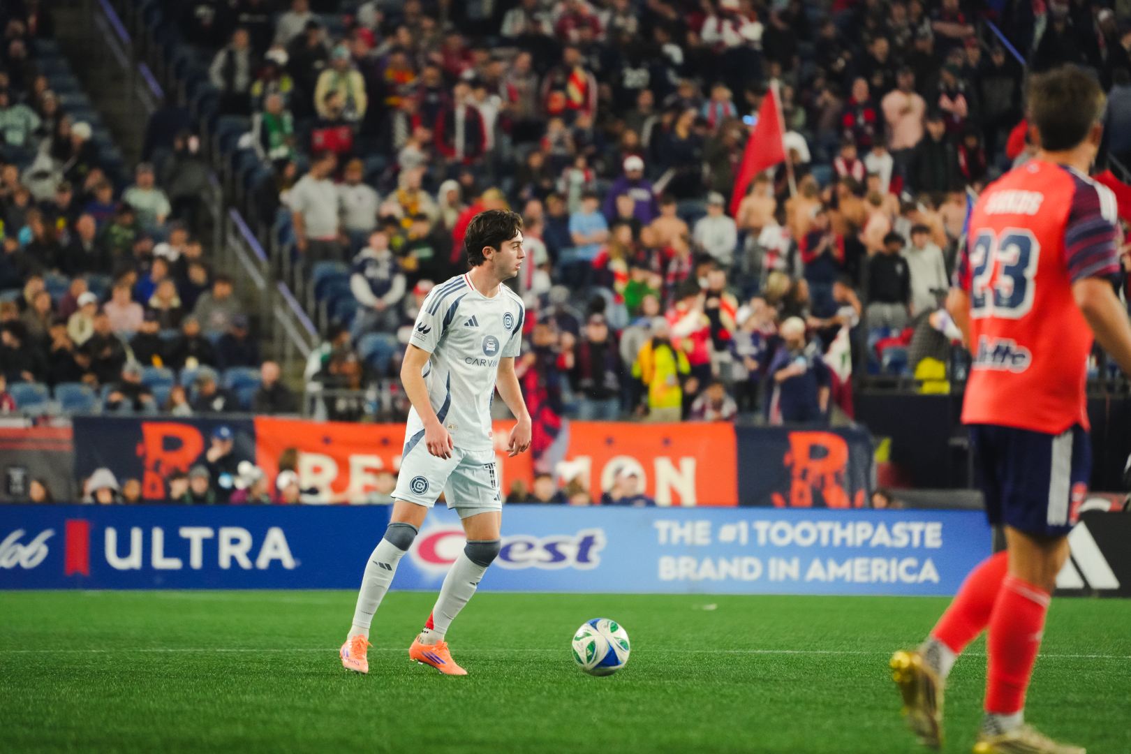 Brian Gutiérrez plays the ball for the Chicago Fire during their game against the New England Revolution on October 18, 2025