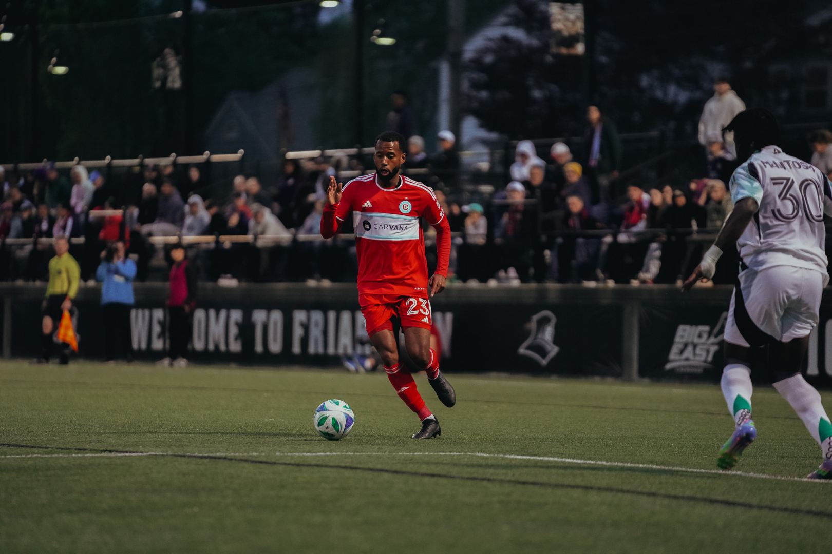 Chicago Fire's Kellyn Acosta plays the ball against the New England Revolution in round 16 of the US Open Cup in Rhode Island on May 20th, 2025.