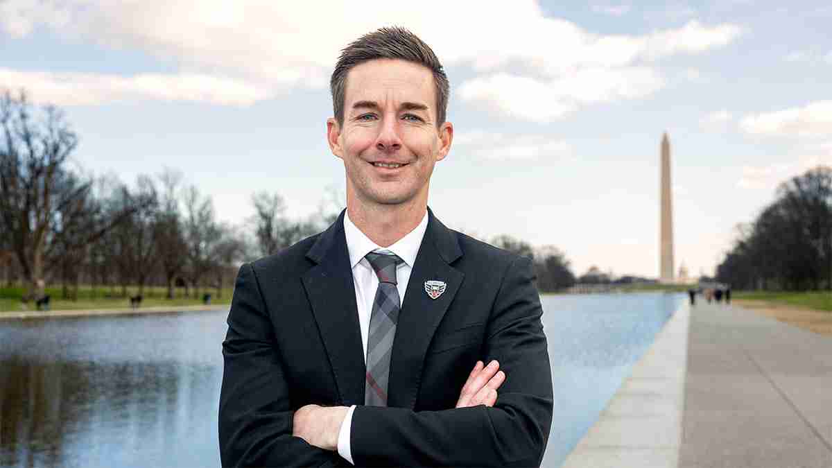 Portrait of Troy Lesesne in front of the Washington MOnument