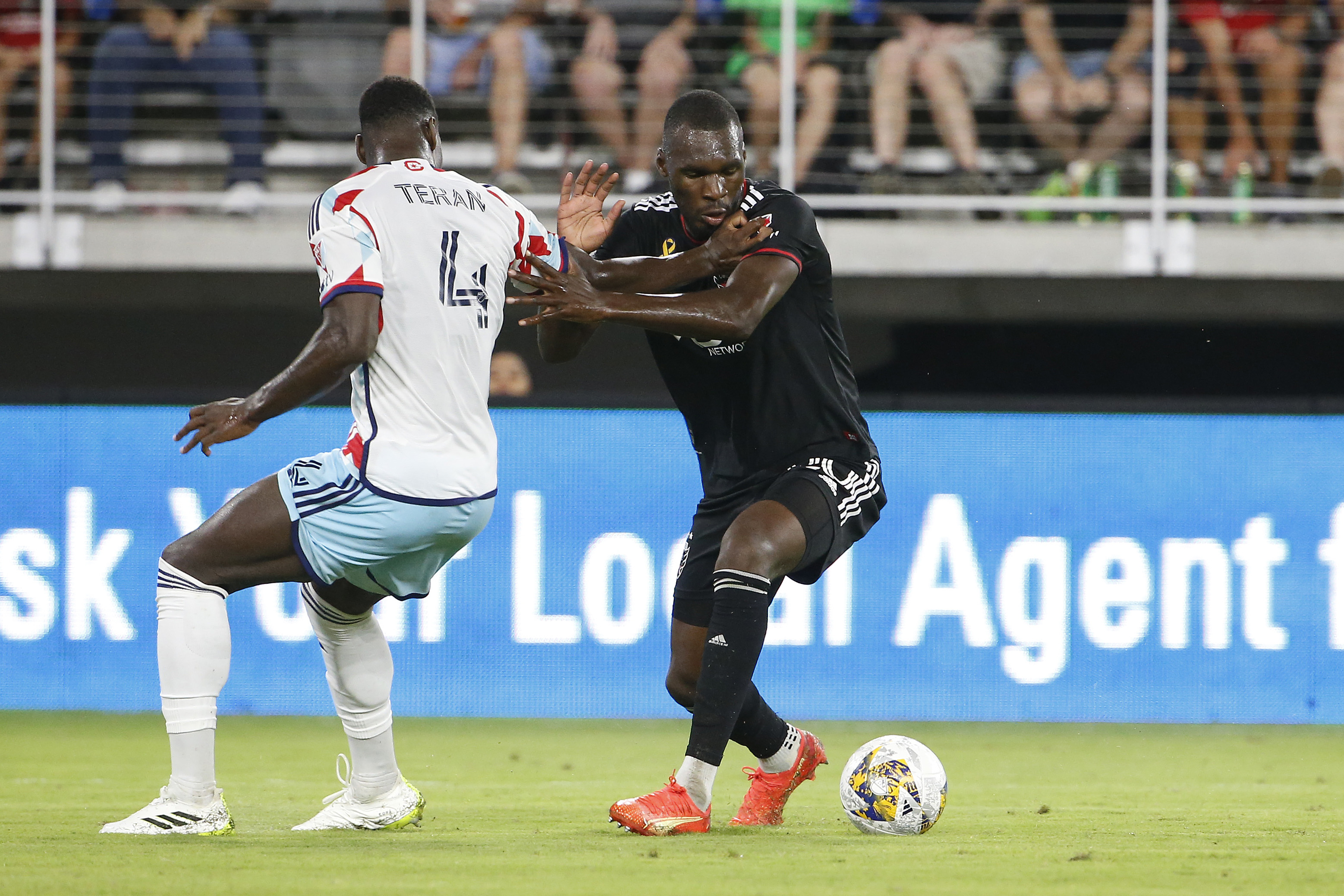 Sep 2, 2023; Washington, District of Columbia, USA; D.C. United forward Christian Benteke (20) battles for the ball with Chicago Fire defender Carlos Teran (4) during the second half at Audi Field.