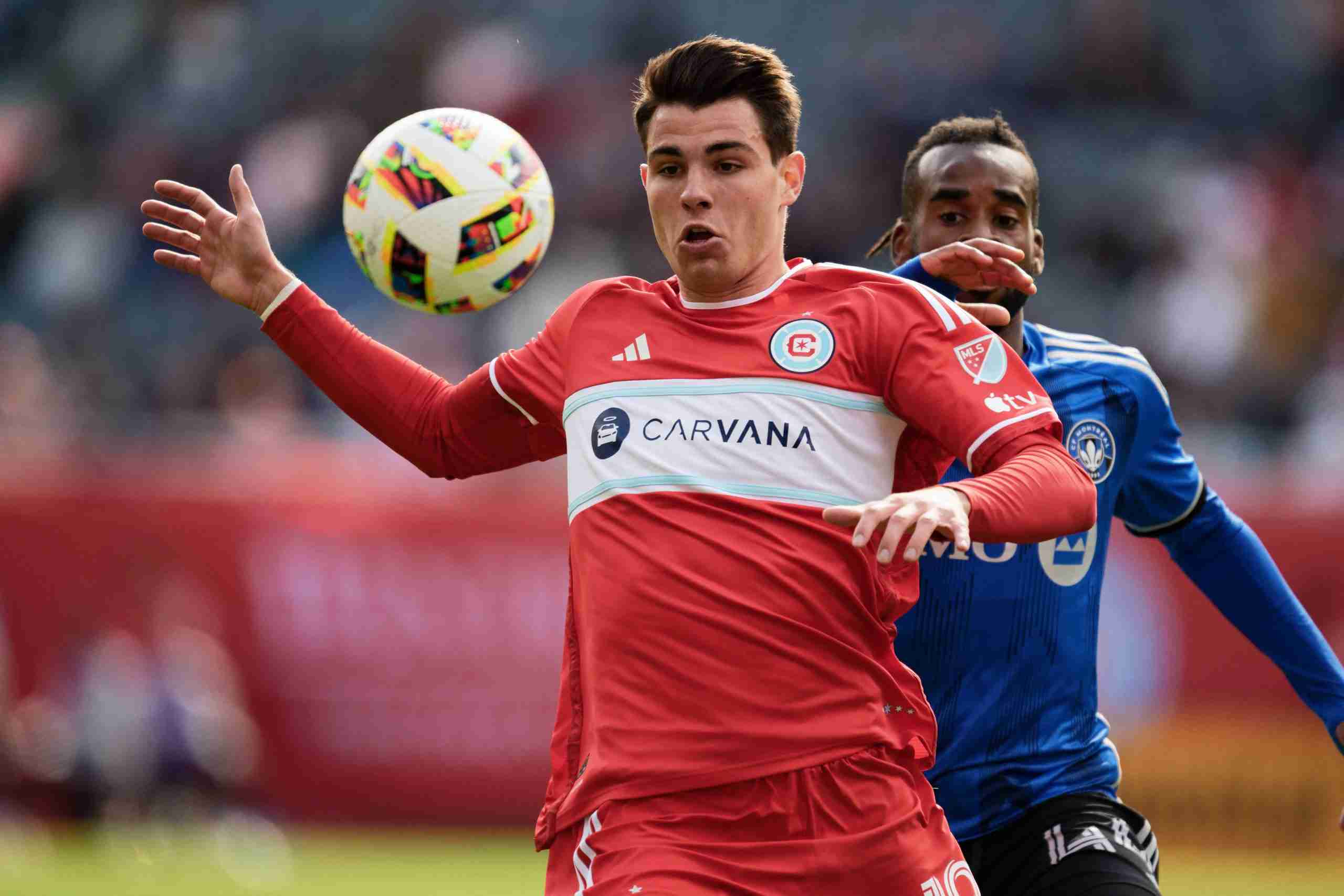 Mar 16, 2024; Chicago, Illinois, USA;  Chicago Fire FC forward Georgios Koutsias (19) controls the ball against CF Montreal at Soldier Field. Mandatory Credit: Jamie Sabau-USA TODAY Sports