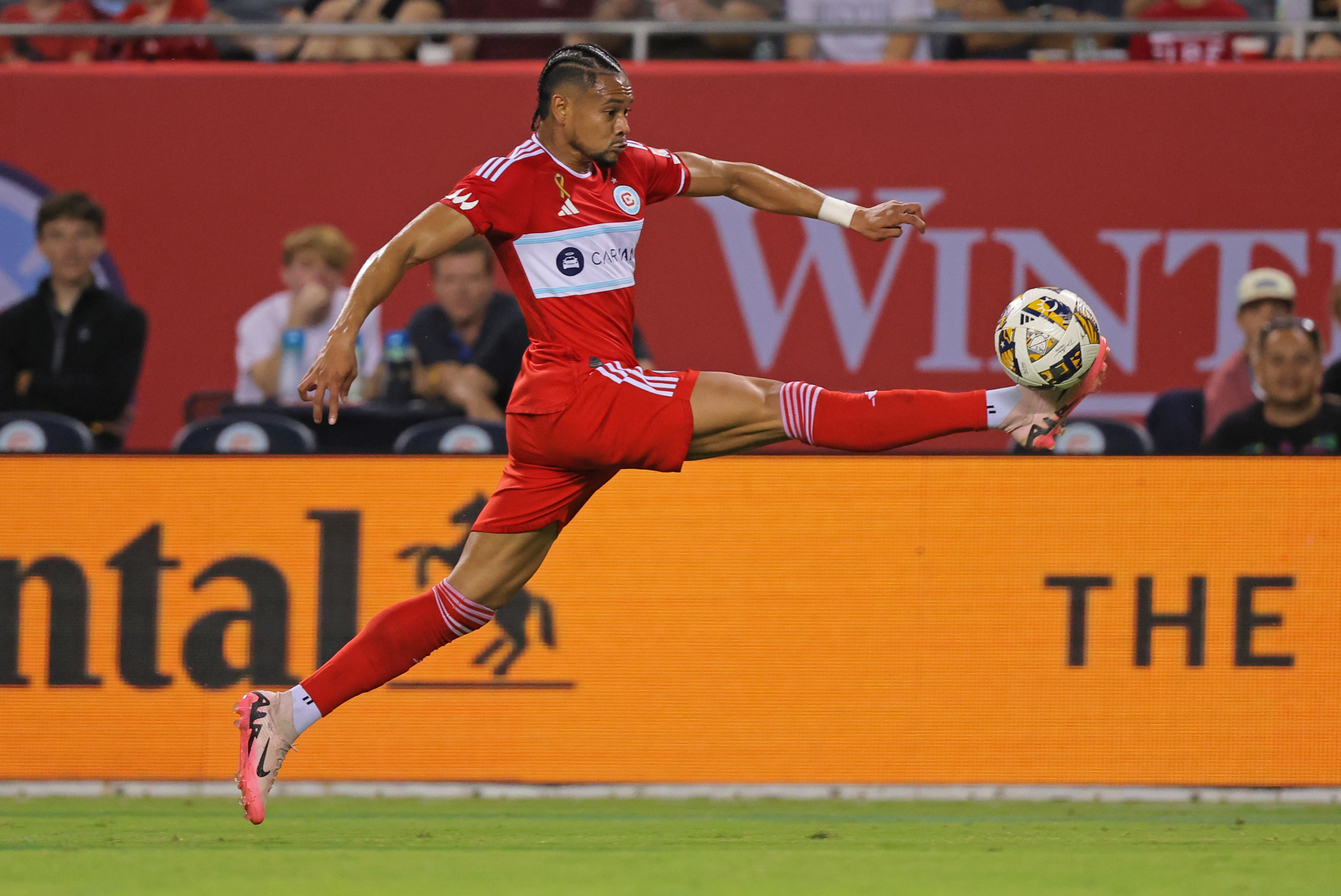 Sep 14, 2024; Chicago, Illinois, USA; Chicago Fire FC midfielder Ariel Lassiter (11) controls the ball during the first half of a match against the New York Red Bulls at Soldier Field.