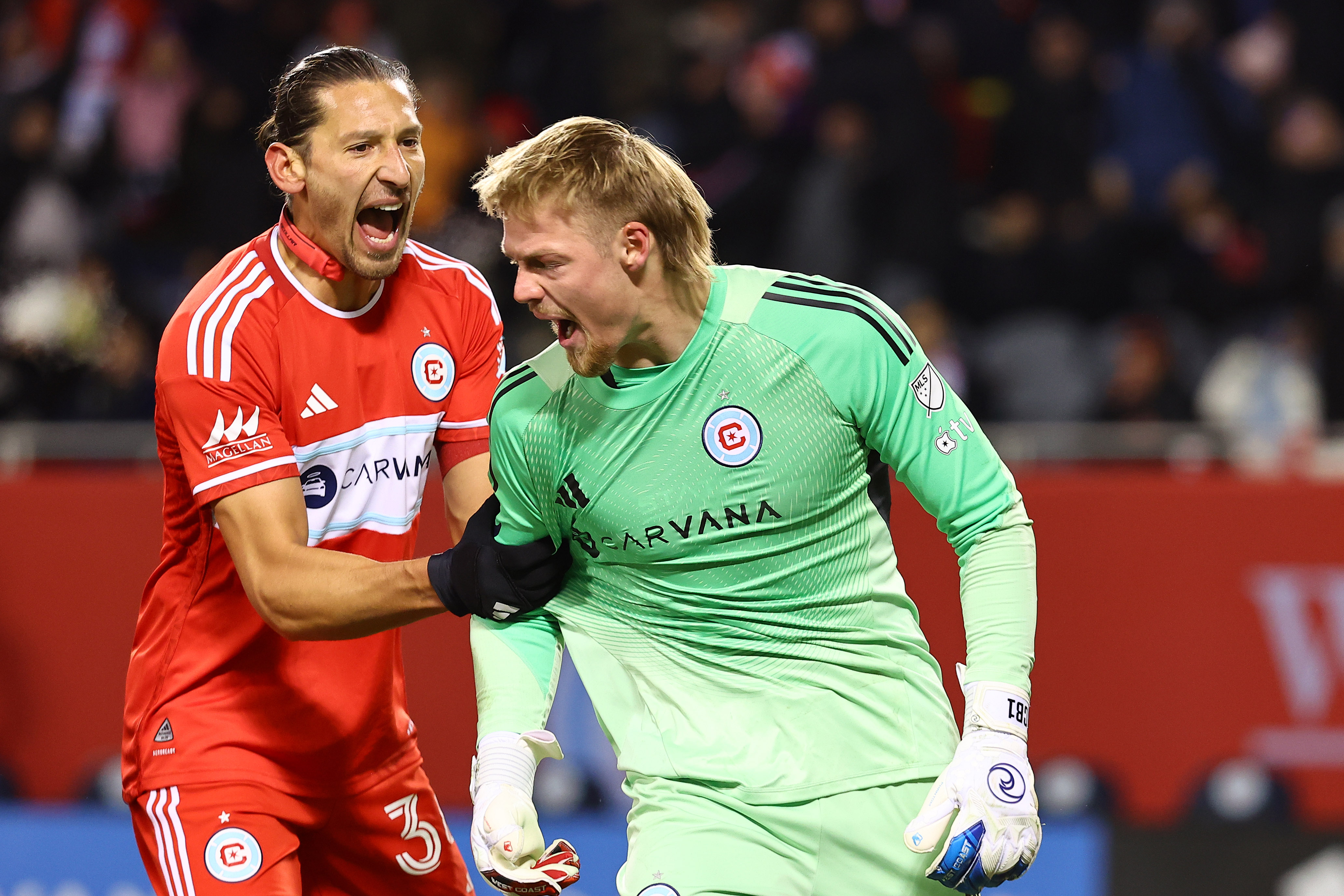Mar 1, 2025; Chicago, Illinois, USA; Chicago Fire FC goalkeeper Chris Brady (1) reacts after making a save against D.C. United during the second half at Soldier Field. 
