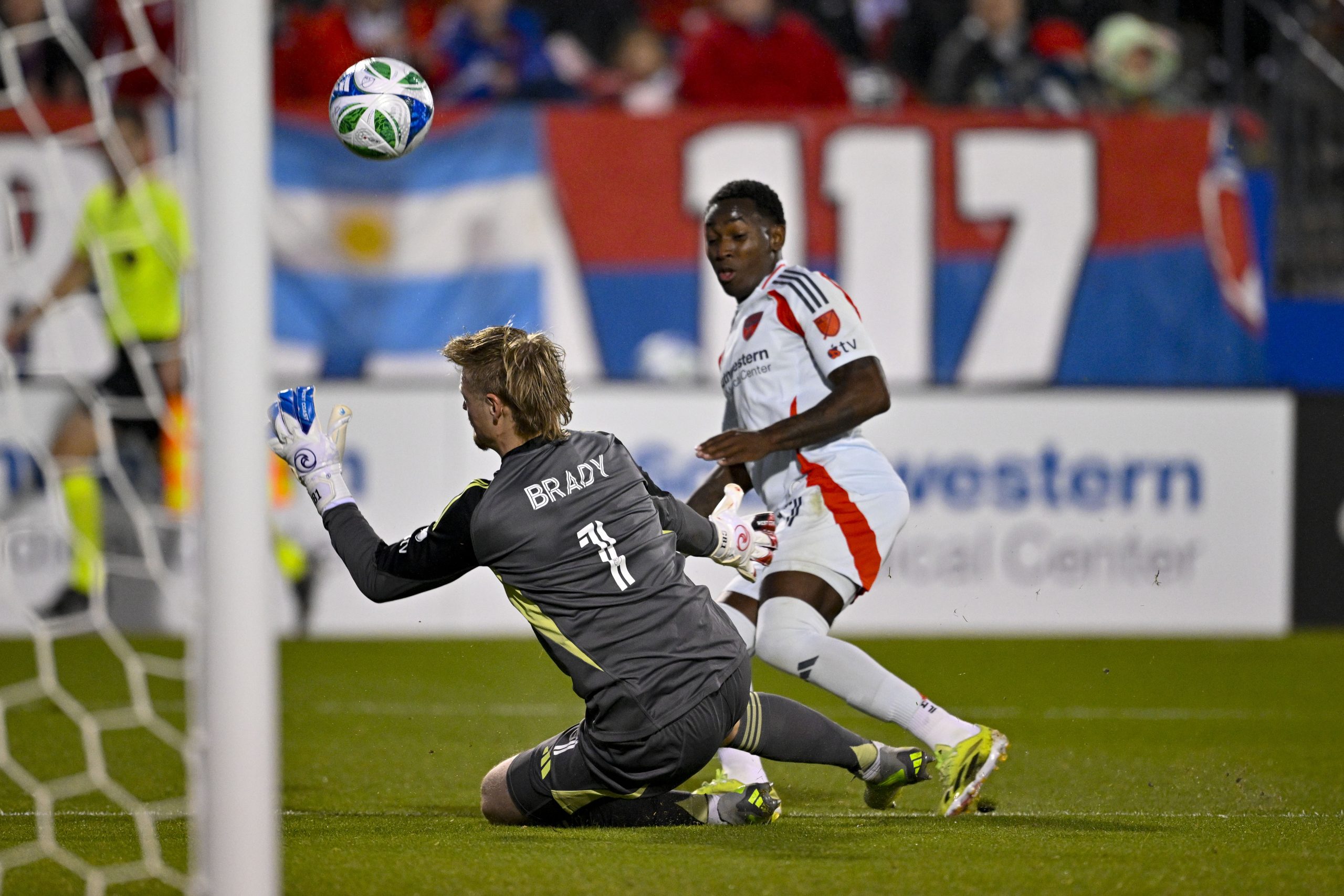 Mar 8, 2025; Frisco, Texas, USA; Chicago Fire goalkeeper Chris Brady (1) stops a shot by FC Dallas midfielder Anderson Julio (11) during the first half at Toyota Stadium.