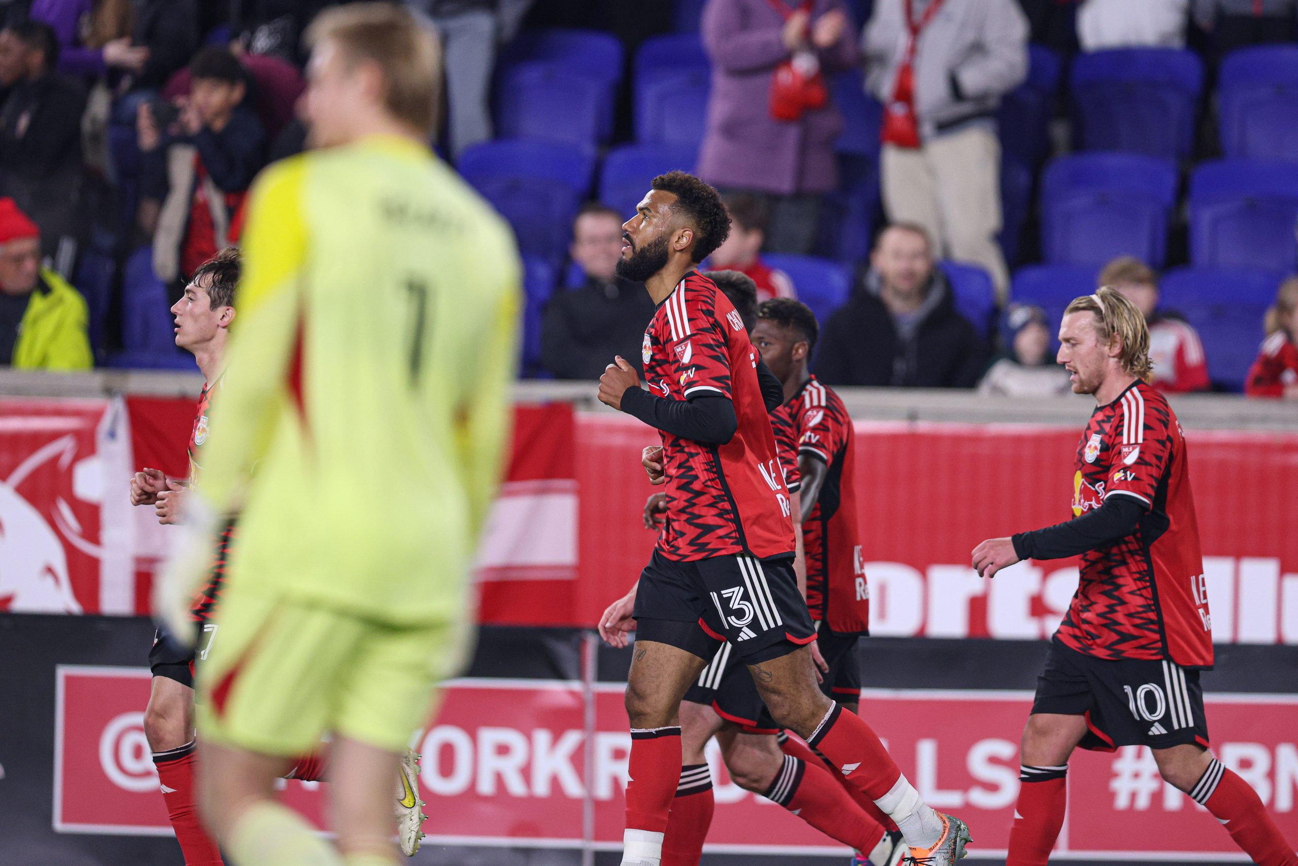 Apr 5, 2025; Harrison, New Jersey, USA; New York Red Bulls forward Eric Maxim Choupo-Moting (13) celebrates with teammates after his goal against Chicago Fire FC during the first half at Sports Illustrated Stadium.