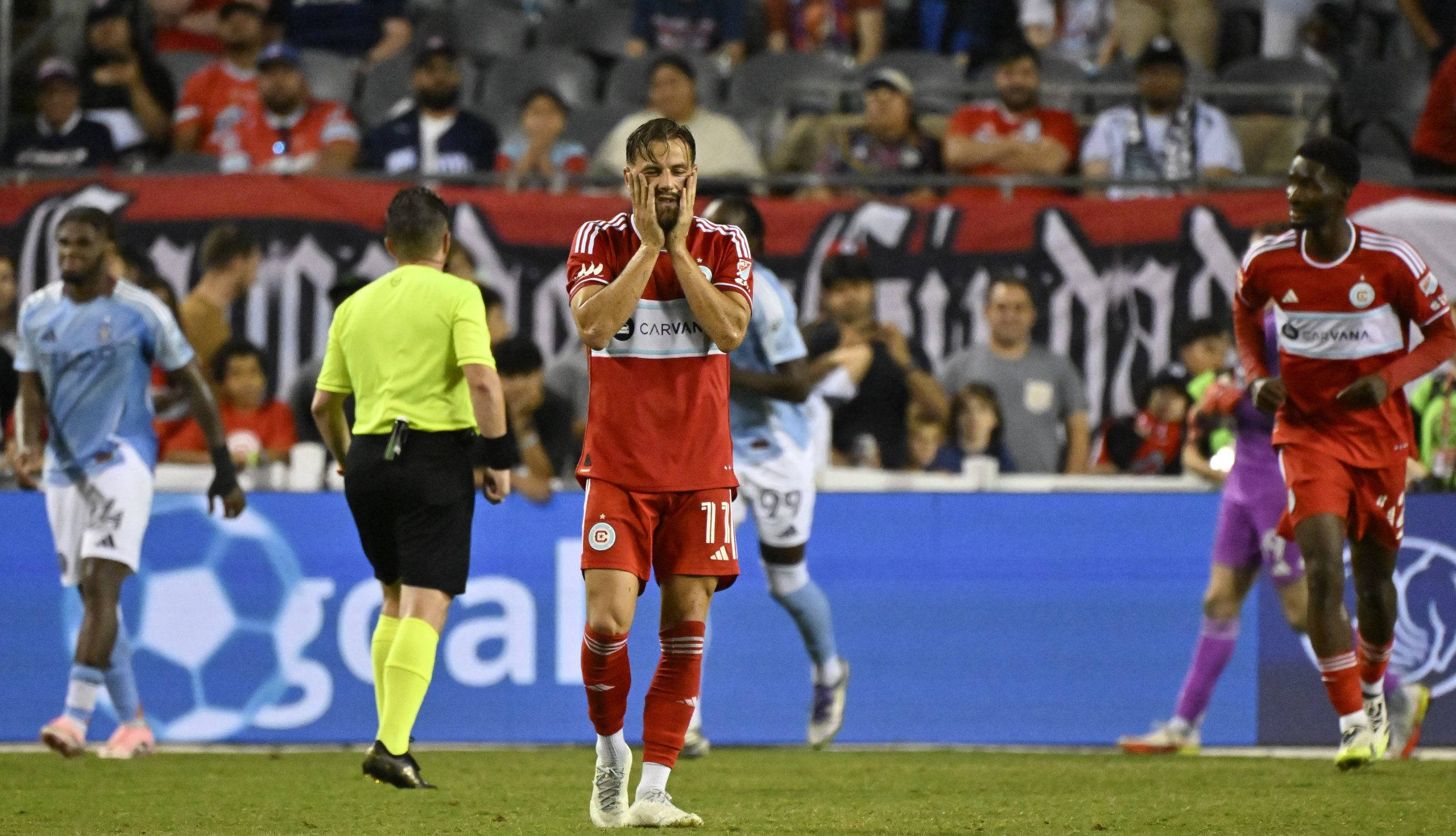 Sep 13, 2025; Chicago, Illinois, USA; Chicago Fire forward Philip Zinckernagel (11) reacts after a penalty shot was missed against the New York City during the second half at Soldier Field.