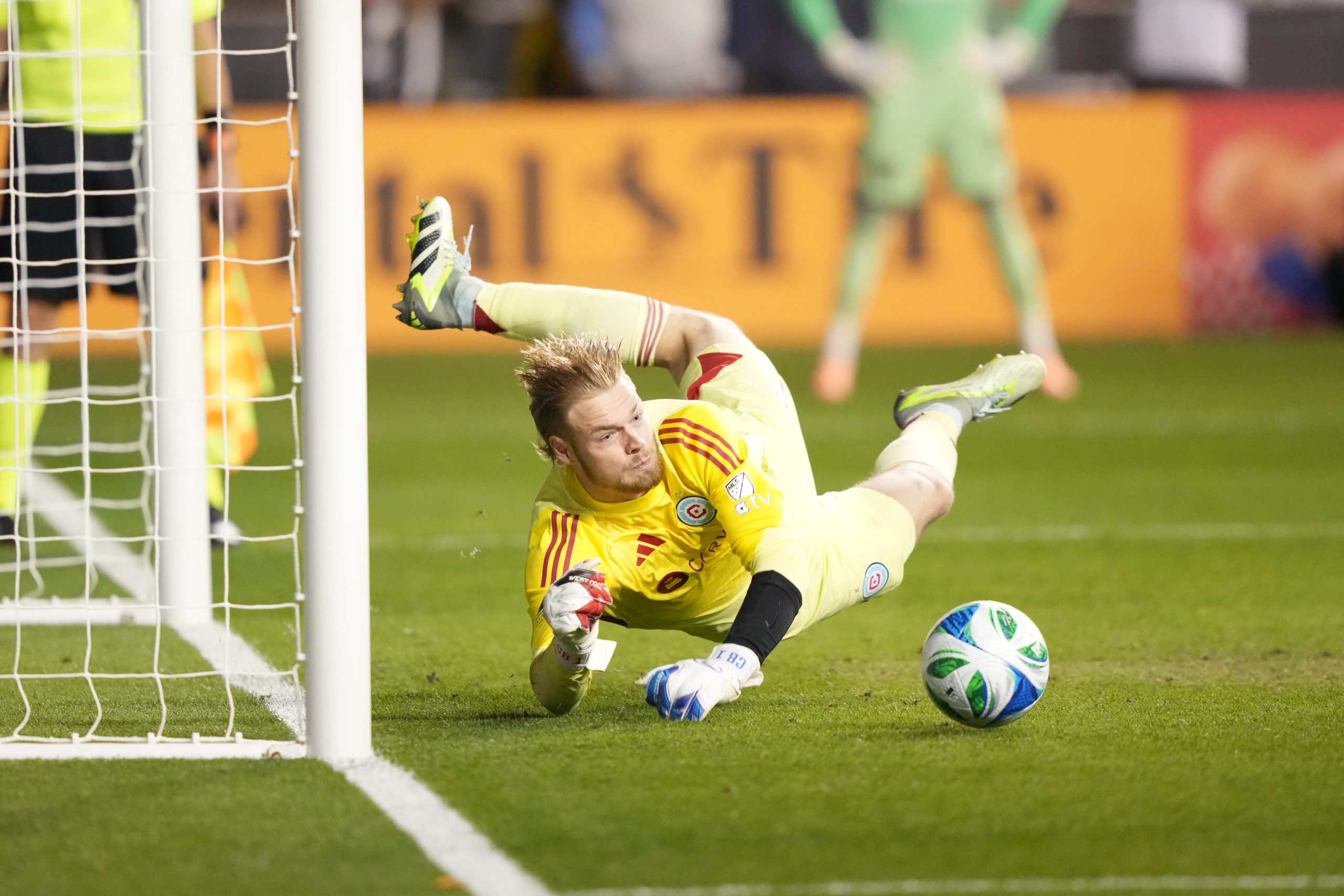 Oct 26, 2025; Chester, Pennsylvania, USA; Chicago Fire FC goalkeeper Chris Brady (1) saves a shootout attempt against the Philadelphia Union at Subaru Park. Mandatory Credit: Kyle Ross-Imagn Images