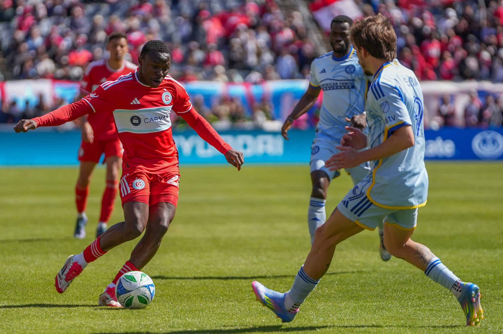 Omari Glasgow of the Chicago Fire dribbles the ball against Atlanta United at Soldier Field in 2025. (photo: Barbara Calabrese)