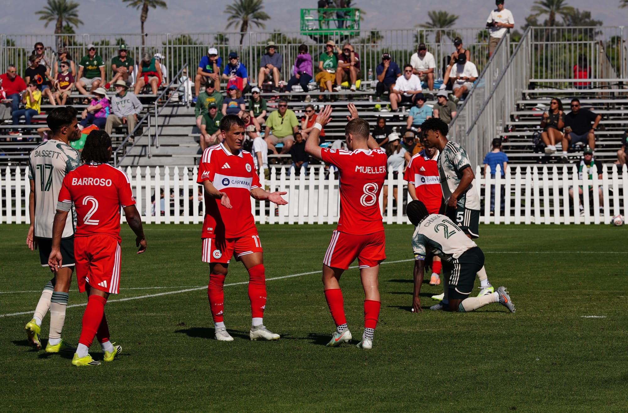 Chirs Mueller and Anton Salétros celebrate after Mueller scored a goal at the Coachella Valley Invitational against the Portland timbers.