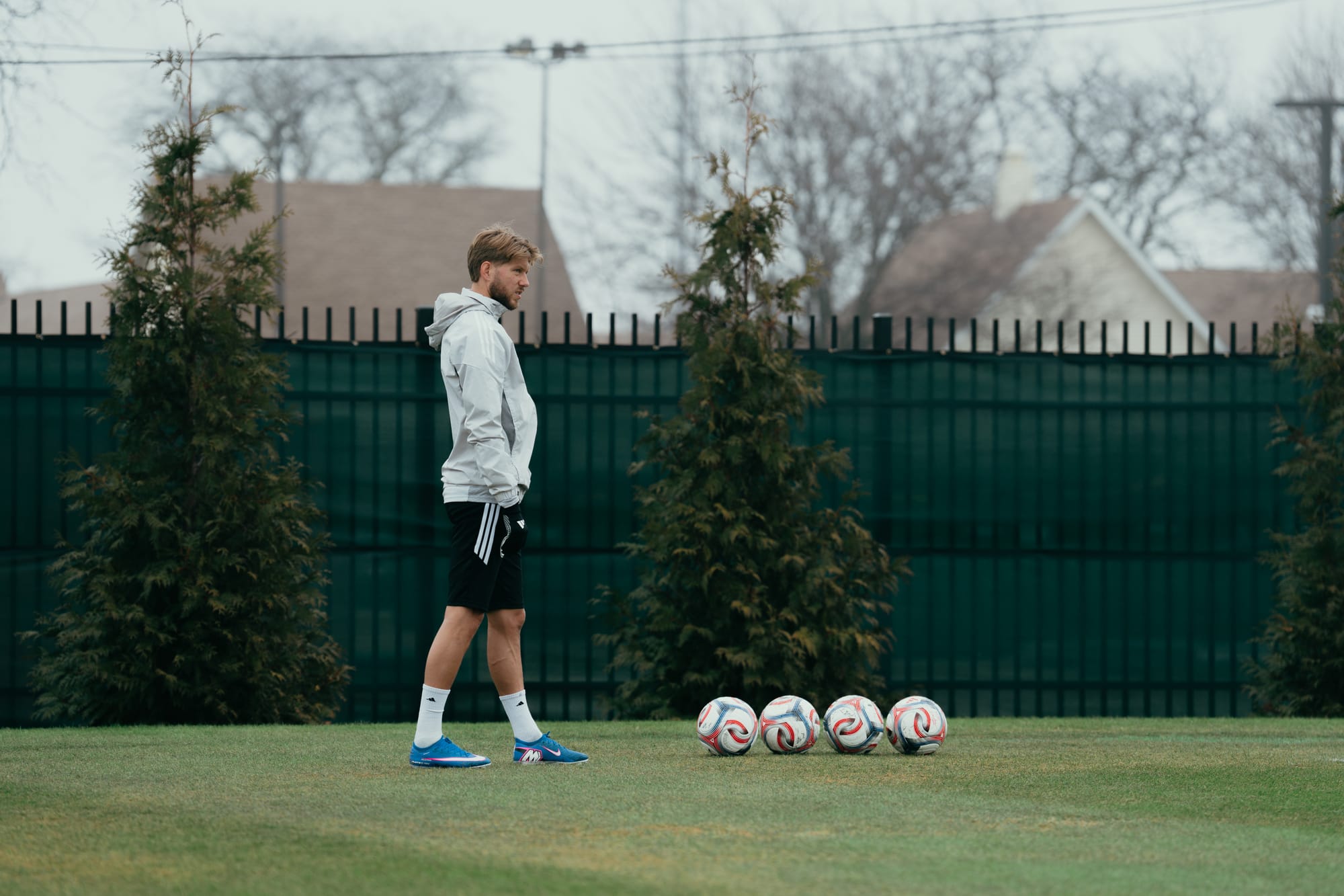 Anton Salétros and four soccer balls during Chicago Fire FC training.