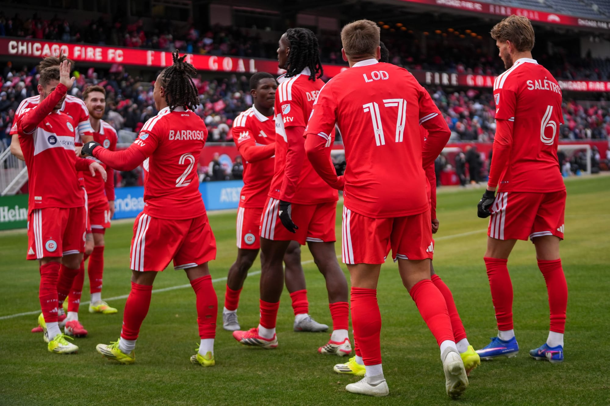Chicago Fire soccer players celebrate Robin Lod's goal at Soldier Field on February 28, 2026