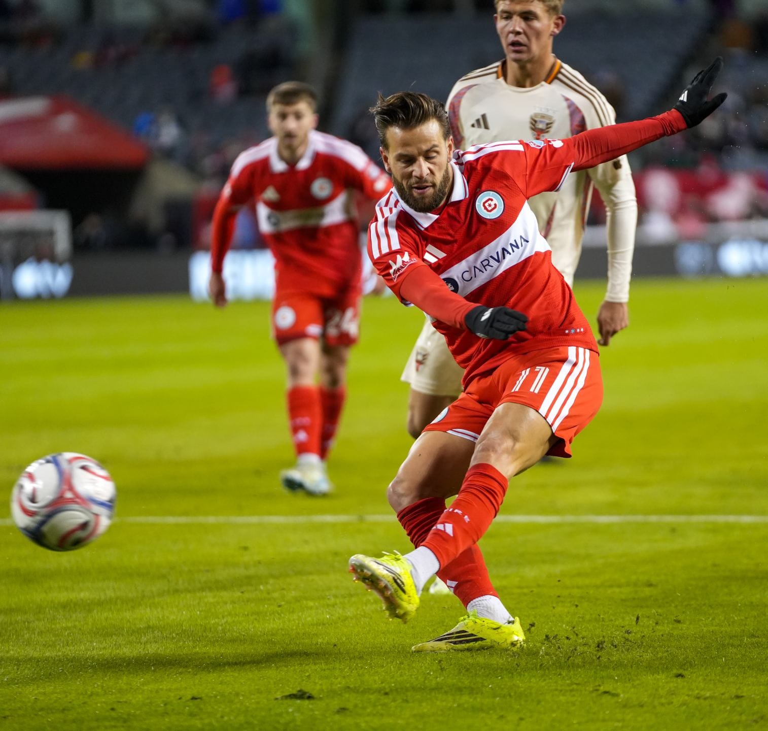Philip Zinckernagel of the Chicago Fire kicks the soccer ball at Soldier Field 